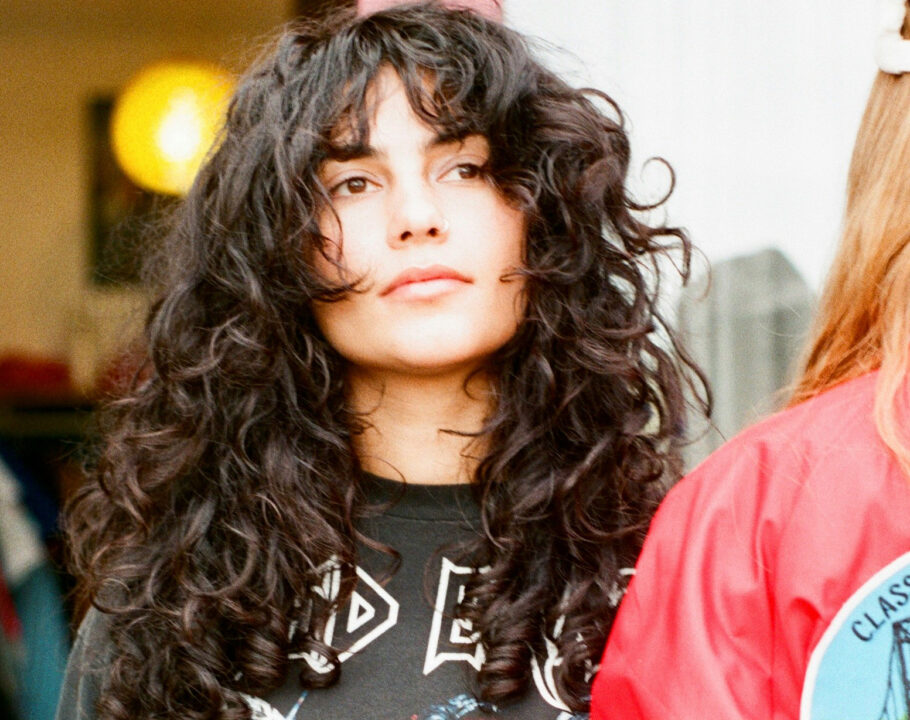 young woman with curly hair